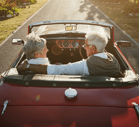 Elderly Couple Driving